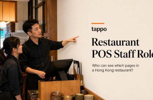 Hong Kong restaurant manager and staff member reviewing a page visibility list beside a POS counter